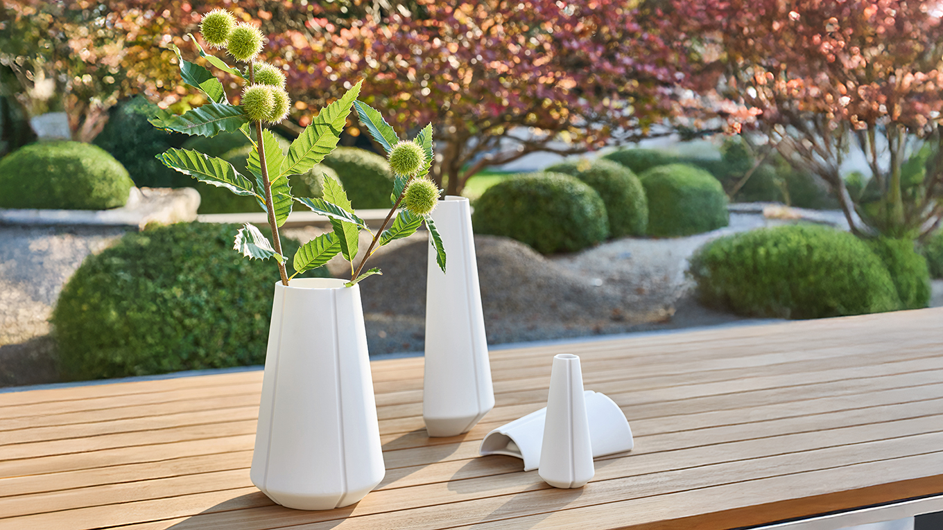 three & two half vases